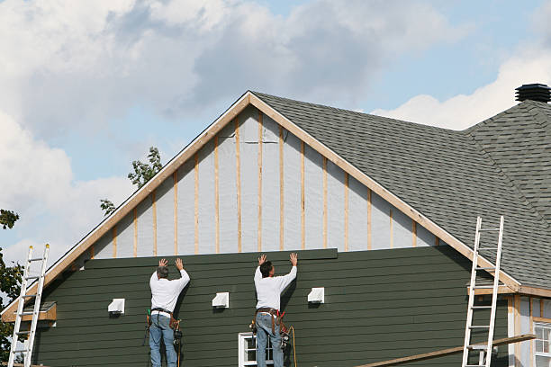 Professional Vinyl Siding technician working in Sidman, PA